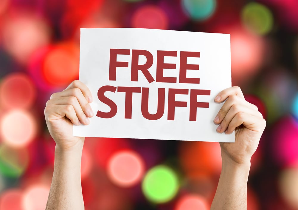 Free Stuff card with colorful background with defocused lights Free Stuff card with colorful background with defocused lights